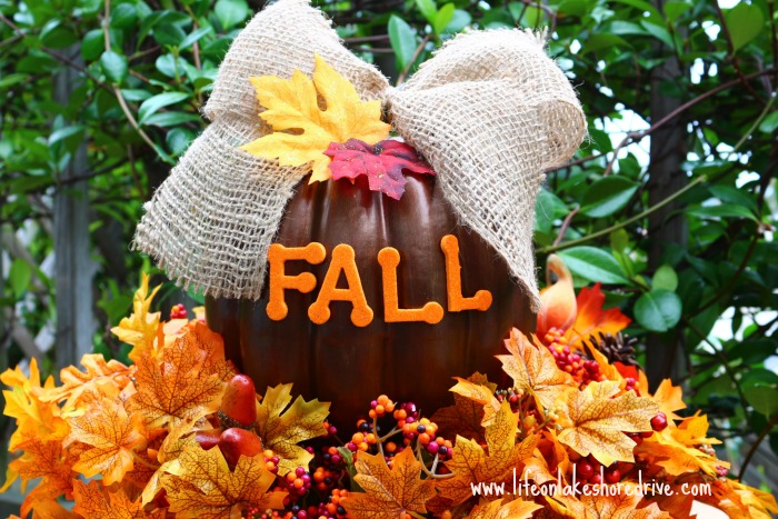 diy fall pumpkin topiary, crafts, seasonal holiday decor, I used Dollar Store leaves and berry picks for the base of the topiary
