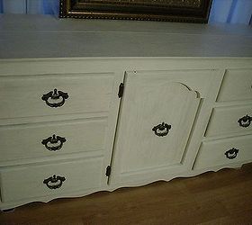 filthy old dresser buffet give new shabby white finish, painted furniture, I gave it a whitewash finish then used a dry brush to pull streaks through the wet paint I clean up the old original hardware and was able to use them all