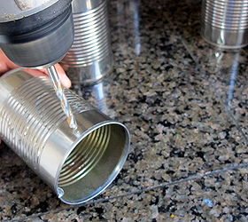 diy tin can lanterns, crafts, outdoor living, repurposing upcycling, I grabbed the drill and found a bit with the sharpest edge I carefully drilled over each dot creating a hole Make sure you wear your safety goggles