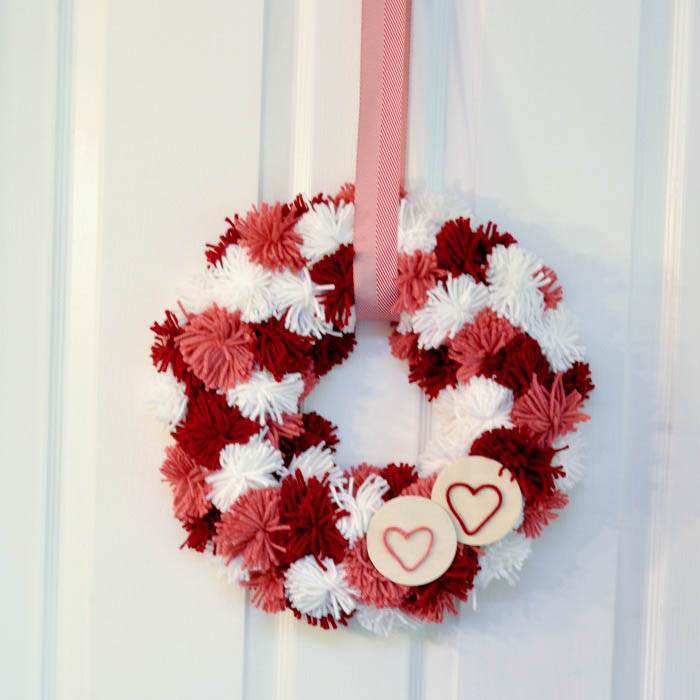 valentine s day pom pom wreath, crafts, seasonal holiday decor, valentines day ideas, wreaths, And voila But I felt it needed a bit more fuss