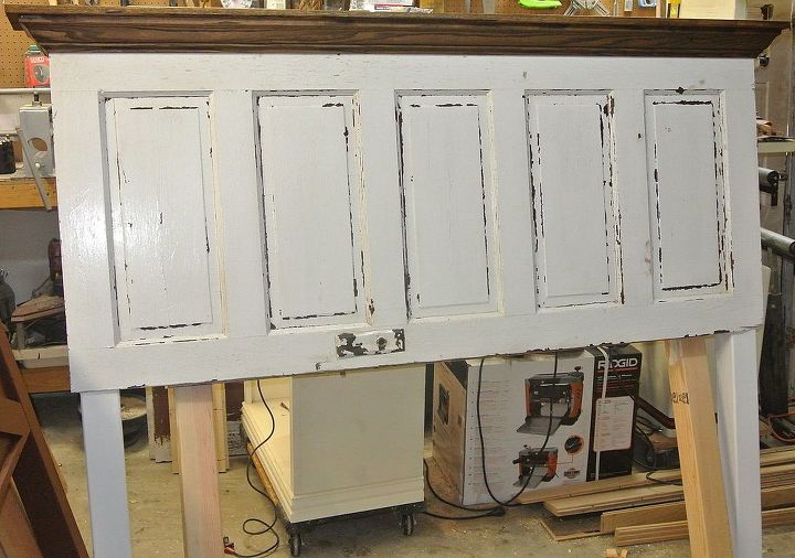 5 panel 90 yr old door converted into a king size door headboard