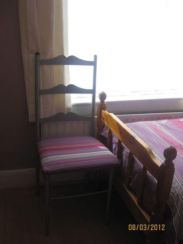 twin guest room, bedroom ideas, home decor, I bought an extra duvet cover and used the material to cover a chair make the pelmet bunting and the curtain next to the wardrobe which covers a series of little shelves
