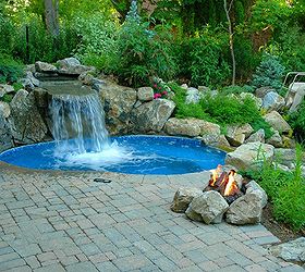 turning a tired backyard into award winning retreat, landscape, outdoor living, ponds water features, pool designs, spas, Raised Spillover Spas