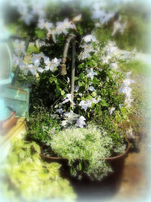 goose neck facet garden planter with my bird feeder, flowers, gardening, outdoor living, repurposing upcycling