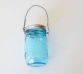 diy mason jar solar lights, crafts, mason jars, repurposing upcycling, Use the bailing wire to create a simple loop to hang your lantern Go around the rim of the jar create a loop go over the top and twist on the other side