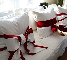 simple valentine s decorating tie a red bow around your sofa pillows, crafts, seasonal holiday decor, valentines day ideas, I do REALLY love the two tone bow But it was time consuming because I sewed it myself Plus I had the not so good idea to have my husband cut the fabric for me