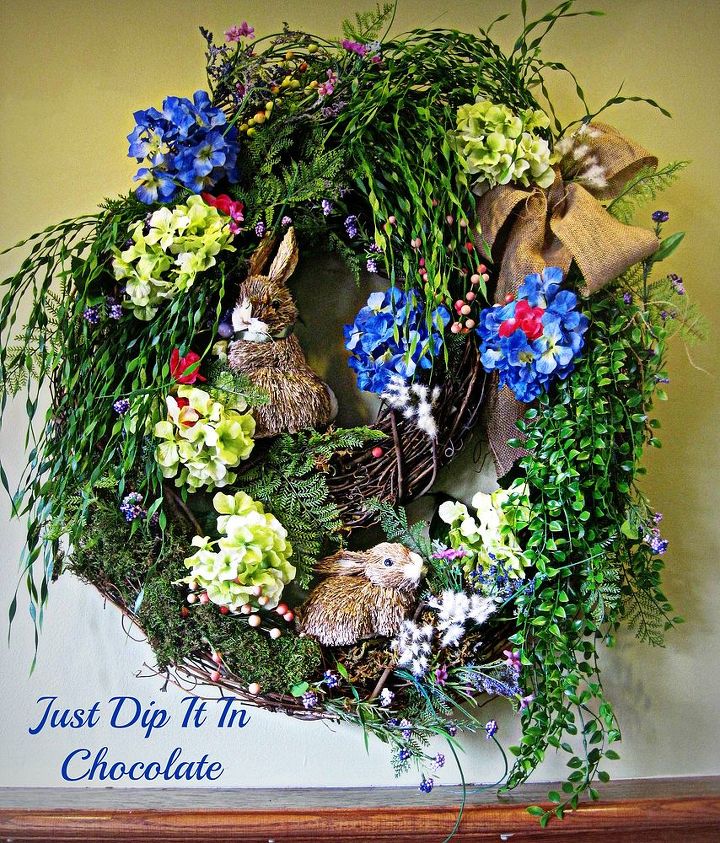rabbit burrow spring wreath, crafts, easter decorations, seasonal holiday decor, wreaths, The final product displays an array of different kind of leaves moss berries and little pieces of cotton making it a very cozy home for our friends