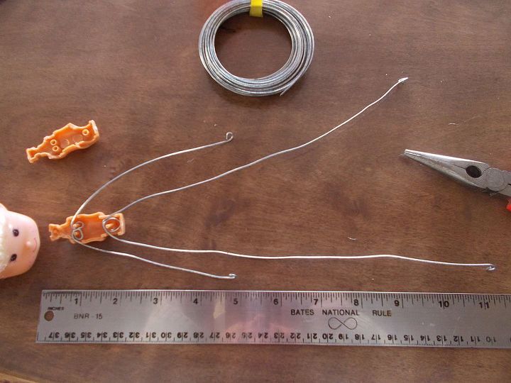 diy pixie elf on shelf, christmas decorations, crafts, seasonal holiday decor, Before snapping the body back together cut the wire to your desired lengths The arms are about 1 2 the length of the legs DO NOT ATTACH HEAD UNTIL HE IS DRESSED