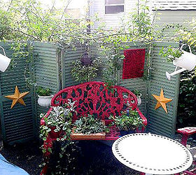 upcycling old shutters in the garden, outdoor living, repurposing upcycling, Cathy Cove used them as a brilliantbackground for her garden vignette