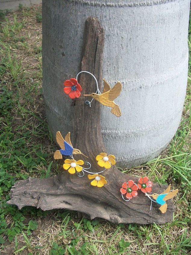 hummingbirds, crafts, woodworking projects, Colorful hummingbirds Used glue to place the small stone in the middle of the flowers