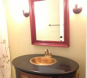goodwood an epic renovation, diy renovations projects, remodeling, The 3rd floor guest bath vanity is an antiqued oval chest with black granite and brass sink The dark stand alone piece contrasts with the spa tile that covers the floor and shower