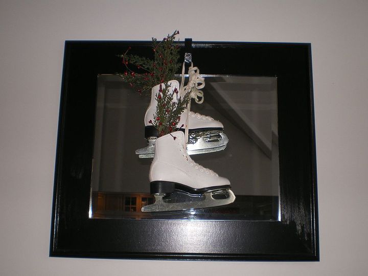 using vintage items in winter decor, christmas decorations, repurposing upcycling, seasonal holiday d cor, Skates are from the 60s but look like new I change out the sprigs of green throughout the winter