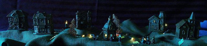 my dollar store thanksgiving village, halloween decorations, seasonal holiday d cor, thanksgiving decorations, This is how it looks at night The picture makes it look like a haunted Halloween Village but in person it looks Thanksgiving