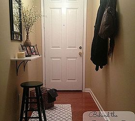 small and narrow entryway update, foyer, home decor, Welcome to my Entryway a mix of warmth and functionality The entryway was inexpensively put together through DIY projects thrift shopping and clearance shelves I love how it turned out