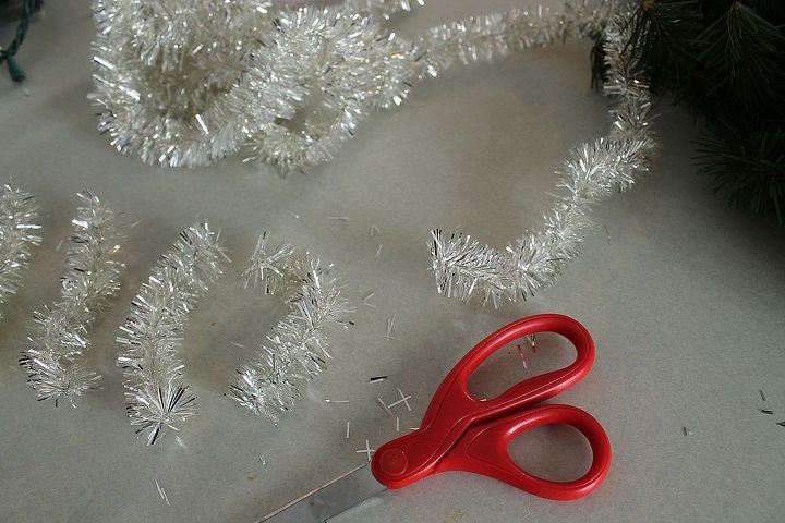 christmas wreath tutorial, christmas decorations, crafts, seasonal holiday decor, wreaths, Cut the garland in 4 inch pieces and glue one end down in between some greens