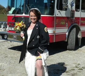 a casual homemade wedding, chalkboard paint, crafts, mason jars, The Bride in her finery wearing her fireman fiance s uniform jacket