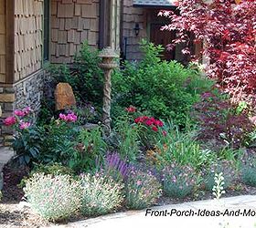 landscaping around your porch, curb appeal, flowers, landscape, The corner of a porch and walkway becomes a focal point with the addition of a bird house small shrubs and perennial flowers