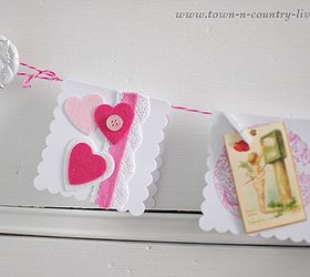 who doesn t love homemade valentines, crafts, seasonal holiday decor, valentines day ideas, Little vintage Valentine cards and felt hearts were used as embellishments