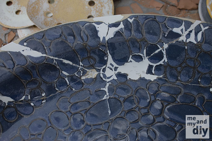 mosaic tile birdbath using recycled dvds, crafts, gardening, repurposing upcycling, After that I used J B WaterWeld to seal the cracks and make it water tight again It s my go to method for repairing things that will be wet or underwater It s also drinking water safe so you don t have to worry about its toxicity