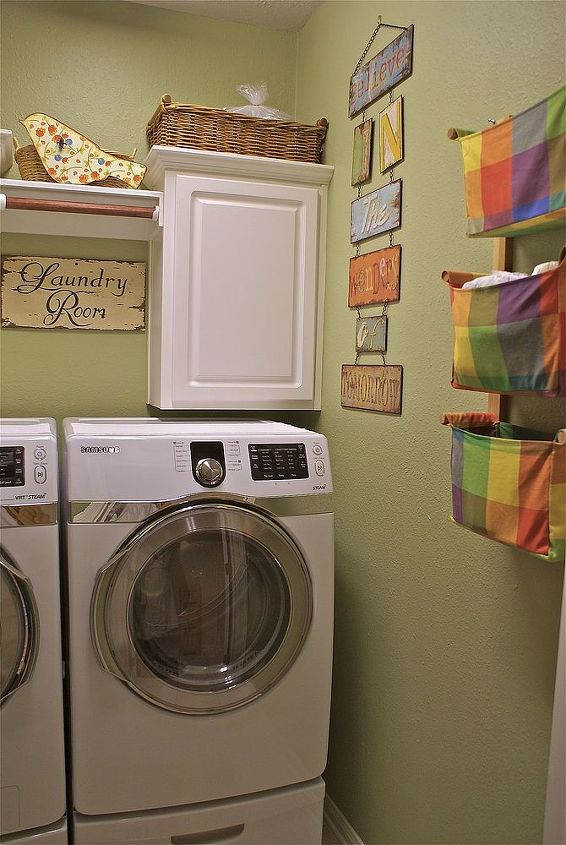 the small laundry dilemma, laundry rooms, I think some handles or knobs for the cabinets