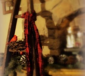 cozy winter mantel, seasonal holiday d cor, A little vintage red bird and nest on an old ladder cozyed up with a winter scarf