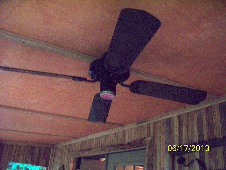 porch makeover, diy, outdoor living, pallet, ceiling fan with light removed canning lid and ring used to cover the end