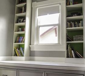 our window seat family library, diy, home decor, how to, storage ideas, Without the cushions you can see where we added trim around the seat base and along the top of the BILLY bookcases to keep the seat in line with our 115 year old trim We also painted the walls behind the bookcases lime green