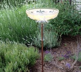 repurposed glass light shades, I used E6000 glue to attach the glass dish vase and vintage light shade It is setting atop a piece of rebar and copper tube
