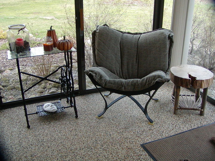 my three seasons porch decorated with mostly finds and vintage, outdoor living, repurposing upcycling, One of two matching comfy chair sits next to an old sewing machine base with a glass top for a table