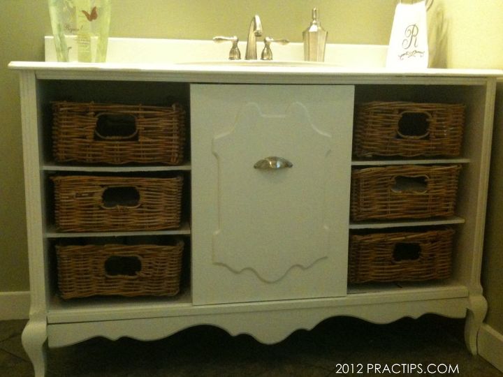 thrifty bathroom sink cabinet, bathroom ideas, kitchen cabinets, I bought an old stereo cabinet for 32 at a thrift store I took it apart cut it to 48 wide and put it back together I added basket drawers and a recycled sink We use it in the kids bathroom