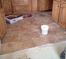 kitchen and dining room tiling a big mistake you don t want to make, diy, kitchen design, tiling, Getting started going row by row making sure your spacer are just right for a perfect grouting job
