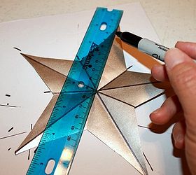paper star garland, crafts, seasonal holiday decor, shabby chic, I marked the creases with sharpie to give it more definition and really stand out See more here