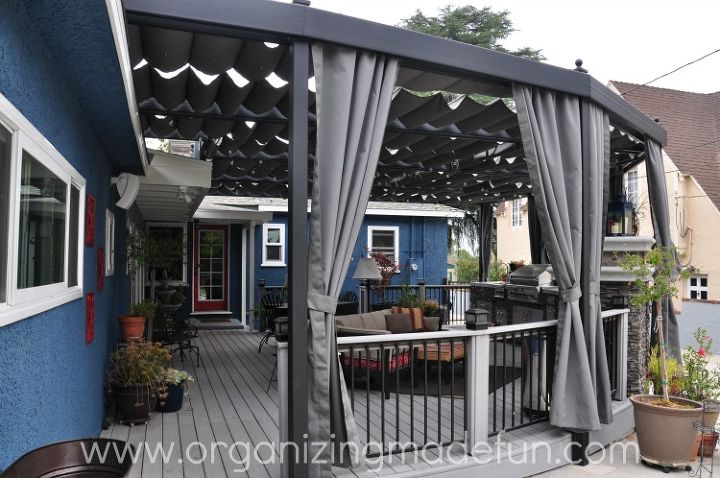 our outdoor kitchen deck and patio cover, fireplaces mantels, home improvement, outdoor living, patio, Curtains open and close to help keep heat and sun out