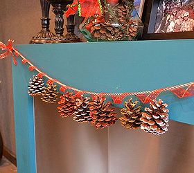 simple scented dazzling pine cone garland, crafts, seasonal holiday decor, I love the way the pine cones look hanging over my fireplace