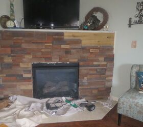 updating a condo fireplace, diy, fireplaces mantels, living room ideas, Stacked rock on a track system much like hanging siding Cut the stone with a diamond blade on a grinder dusty but with perfect cuts