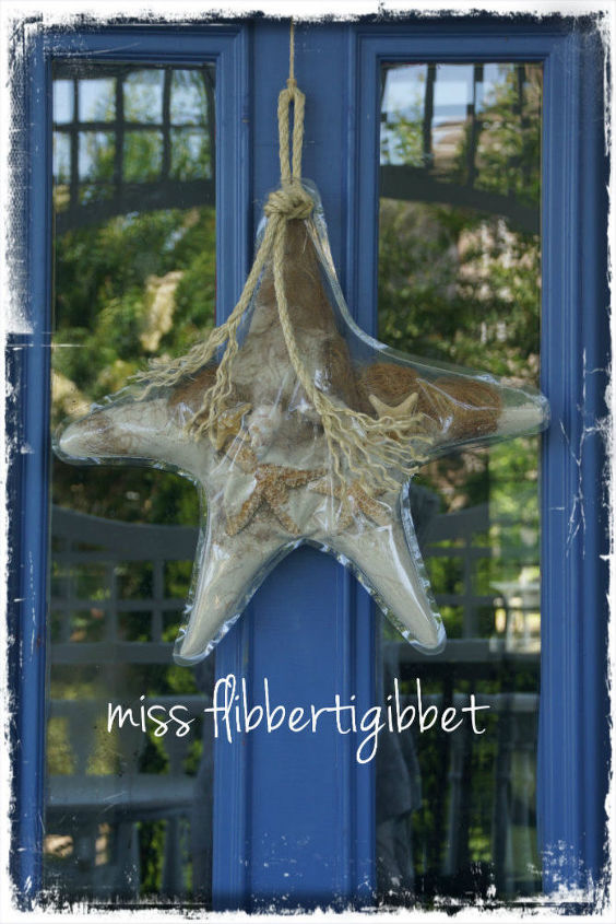 some projects, chalk paint, crafts, doors, painted furniture, A starfish door decoration made from heavy clear vinyl sewn into a starfish shape and filled with sand shells grass and of course starfish Hung with a piece of rope