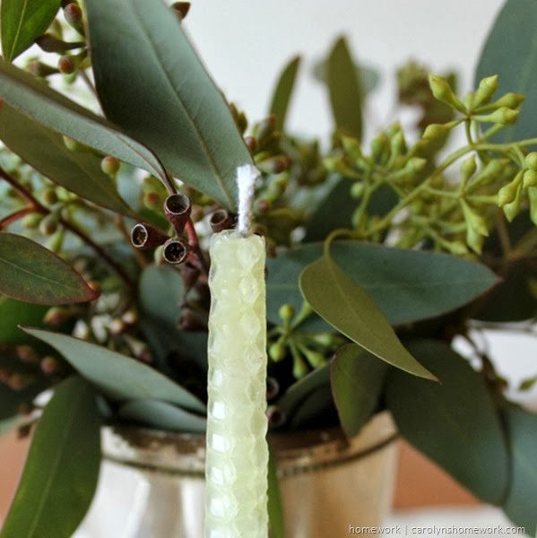 a winter centerpiece after the holidays, christmas decorations, seasonal holiday d cor, Beeswax candles found on clearance after the holidays Eucalyptus branches add a breath of fresh air and just the right amount of green
