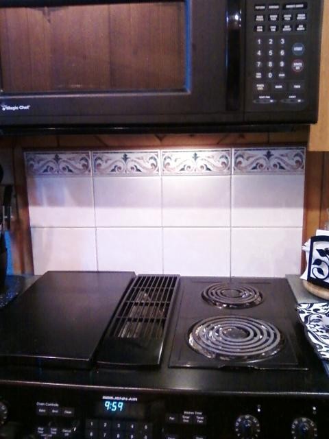 just changed the back splash and flooring in my 50 s knotty pine kitchen, home decor, kitchen backsplash, kitchen design, tile flooring, tiling, old ceramic tile back splash