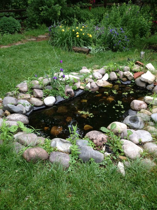 pond and waterfall for kids, outdoor living, ponds water features, This is what they had for years A dysfunctional pond with lack of filtration Basically an eyesore and mosquito breeding ground