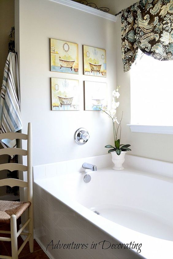 our master bath then and now, bathroom ideas, home decor, Inexpensive art from Kirkland s fills the wall