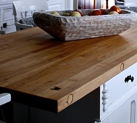 inexpensive options for beautiful countertops, countertops, diy, home decor, kitchen design, kitchen island, repurposing upcycling, detail of our island top refinished and branded with kents W brand That is also one of his sarved bowls To see more of his work