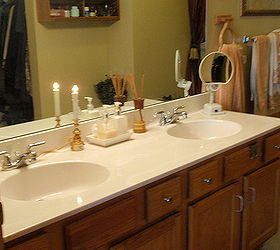 q all suggestions to our master bath please, bathroom ideas, home decor, painted furniture, Double vanity Would like to take down large mirror and replace with two decorative mirrors with lights Restain cabinets and trim to cherry