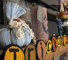 frugal fall decorating, crafts, flowers, repurposing upcycling, seasonal holiday decor, Sweater pumpkins made from old sweater sleeves and a paperback book pumpkin too