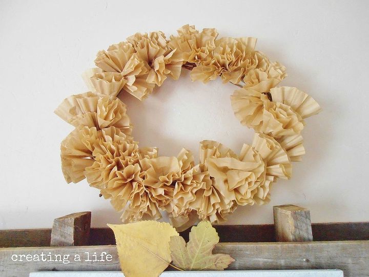 rustic pallet decor the autumn mantel, pallet, repurposing upcycling, seasonal holiday d cor, wreaths, Above the pallet I hung a brown coffee filter wreath