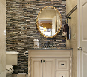 5 things to know about marble and mosaic tile before you buy, bathroom ideas, tiling, This small powder room features marble tile and marble mosaics Hand carved and custom made mirror is complemented by the elegant and luxurious light fixture