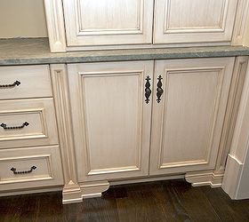 details they do matter when it comes to molding, doors, home decor, painted furniture, Another example of columns and valance boards in addition this displays another alternative to a full height pantry Note the upper cabinet is slightly less in depth hiding behind pocket doors is an appliance center
