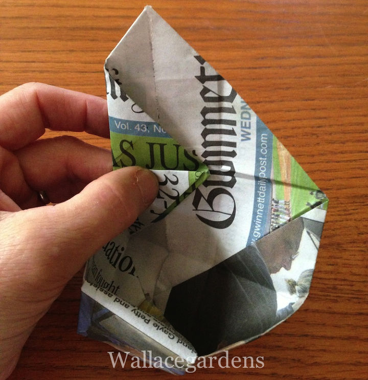 origami paper seedling pots from newspaper, Do the same thing on the opposite side open one point of the square and take the upper left corner and fold it straight across to meet the fold line reversing the crease