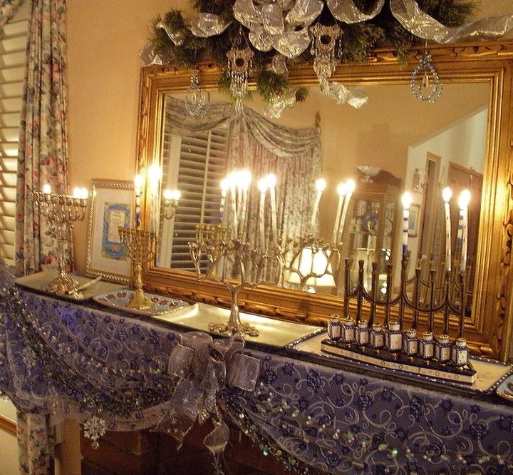 chanukah mantelpiece designs, christmas decorations, seasonal holiday d cor, In the living room everyone lights their own menorah The mirror doubles the joy Having the candles on the mantel means they can be seen through the front windows fulfilling the tradition to display the light to the world