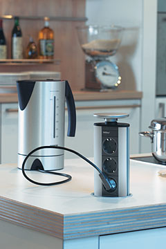 which outlet would you prefer in a kitchen island, Retractable or pop up style Evoline shown