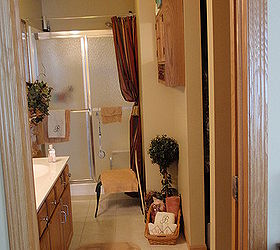 q all suggestions to our master bath please, bathroom ideas, home decor, painted furniture, I am not a fan of sliding shower doors replace with clear glass door put in The room is decent sized but poorly designed
